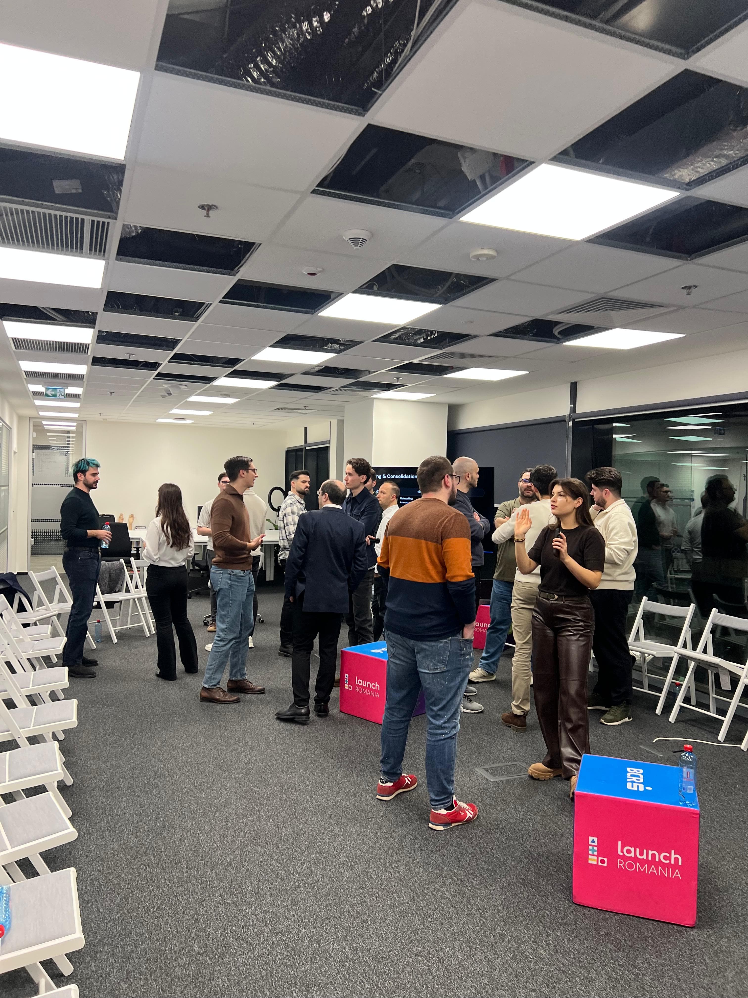 People talking during the DevNights mixer